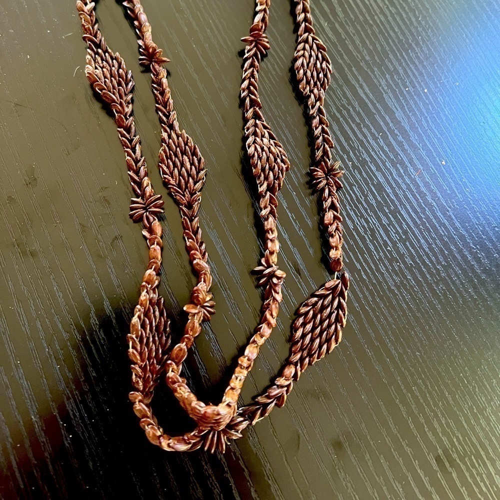 Handmade world traveler seed necklace